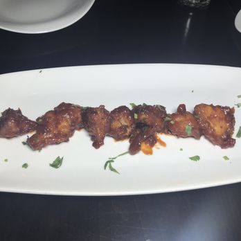 Utsav - Lasani Gobhi--cauliflower in a siracha garlic sauce with a tomato "tang" - Indian Near Me - New York, New York Utsav - Lasani Gobhi--cauliflower in a siracha garlic sauce with a tomato "tang" - Indian Near Me - New York, New York