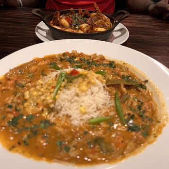 French Quarter - Crawfish Étouffée with Shrimp and Grits in the back - Bars Near Me - Boston, Massachusetts French Quarter - Crawfish Étouffée with Shrimp and Grits in the back - Bars Near Me - Boston, Massachusetts