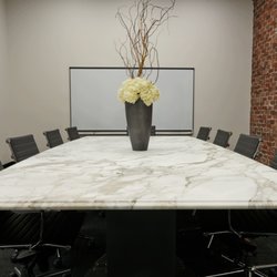 Signature Countertops - Calacatta Vagli Marble Honed with an Ogee Edge.