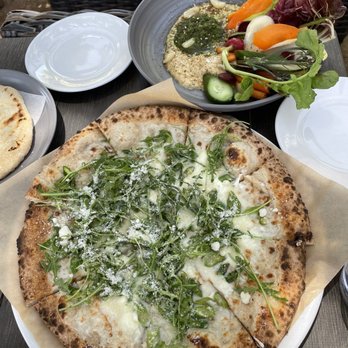 Roblar Winery - Arugula asparagus and goat cheese pizza with a side of smoked hummus - Wineries Near Me - Santa Ynez, California Roblar Winery - Arugula asparagus and goat cheese pizza with a side of smoked hummus - Wineries Near Me - Santa Ynez, California