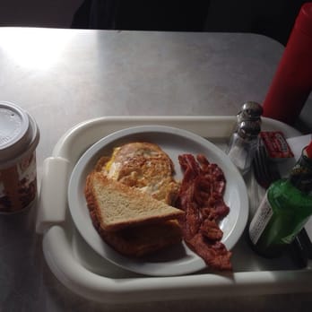Silver Cafe - a breakfast tray with a sandwich, bacon, and coffee - Burgers Near Me - San Francisco, California