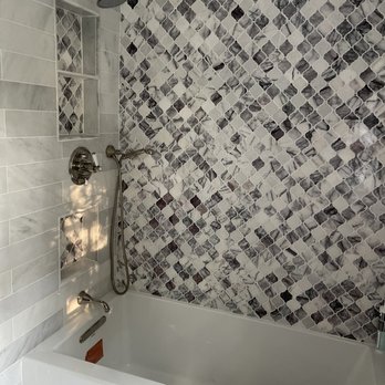 The Tile Shop - a bathtub and shower - Flooring Near Me - Watertown, Massachusetts