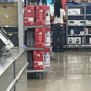 Walmart Supercenter - This is the employee that says would help me, but instead of helping me open the electronics door, she played on the switch - Department Stores Near Me - Troy, Michigan