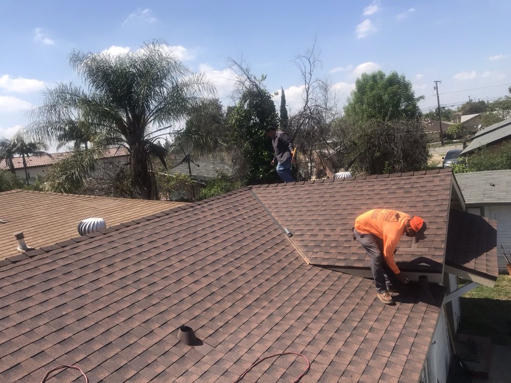 Slide of MA Roofing and Gutters