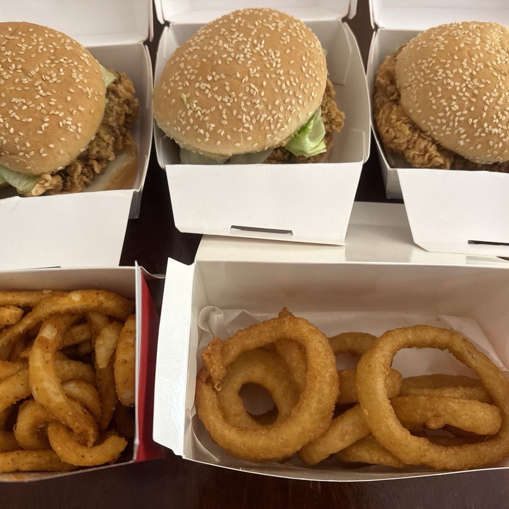 2 crispy chicken sandwiches, 1 spicy chicken sandwich, curly fries, & onion rings 2 crispy chicken sandwiches, 1 spicy chicken sandwich, curly fries, & onion rings