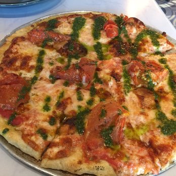 Rustiko - Caprese, Gouda, pesto, sun dried and tomatoes pizza !!! SO YUM YUM - Kosher Near Me - Surfside, Florida