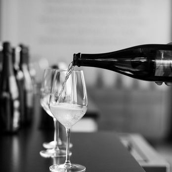 Blustone Vineyards - Wine at bar! - Wine Tasting Room Near Me - Lake Leelanau, Michigan Blustone Vineyards - Wine at bar! - Wine Tasting Room Near Me - Lake Leelanau, Michigan