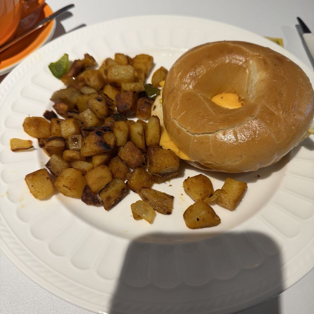 Cafe Amico - Egg and cheese bagel with potatoes - Sandwiches Near Me - Roswell, Georgia Cafe Amico - Egg and cheese bagel with potatoes - Sandwiches Near Me - Roswell, Georgia