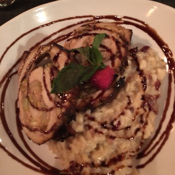 Bistro 29 - Pork tenderloin with cranberry, apples over risotto. - New American Near Me - Murphy, North Carolina Bistro 29 - Pork tenderloin with cranberry, apples over risotto. - New American Near Me - Murphy, North Carolina