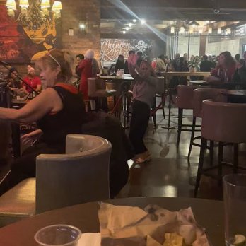 George Lopez's Chingon Kitchen - Music - you can see the line to order food in the background - Mexican Near Me - Highland, California