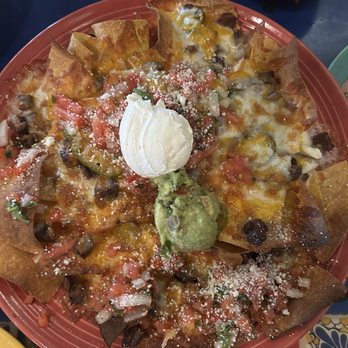 Patron Azteca - Steak nachos it was good but the steak was a little burnt but the plate was hot - Bars Near Me - Coral Springs, Florida Patron Azteca - Steak nachos it was good but the steak was a little burnt but the plate was hot - Bars Near Me - Coral Springs, Florida