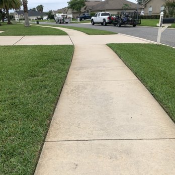 Lawns By JL - a sidewalk in a residential neighborhood - Lawn Services Near Me Lawns By JL - a sidewalk in a residential neighborhood - Lawn Services Near Me
