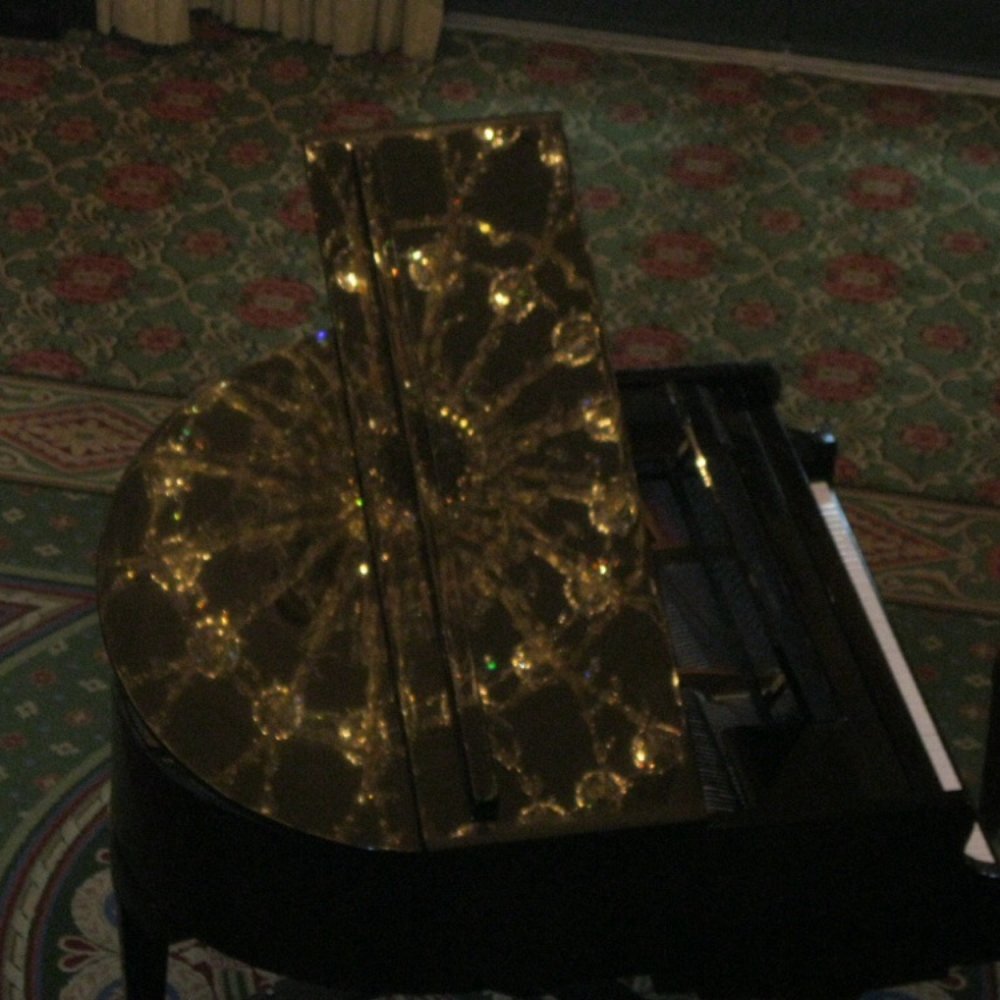Omni Severin Hotel - The original 1913 chandelier reflected off the piano. - Hotels Near Me - Indianapolis, Indiana Omni Severin Hotel - The original 1913 chandelier reflected off the piano. - Hotels Near Me - Indianapolis, Indiana