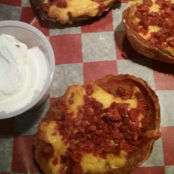Coaches Bar & Grille - 9 Potatoe skins.... note the fake bacon bits topping...WHY!!! - Sports Bars Near Me - Essington, Pennsylvania Coaches Bar & Grille - 9 Potatoe skins.... note the fake bacon bits topping...WHY!!! - Sports Bars Near Me - Essington, Pennsylvania
