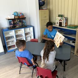 Montessori On Elm - My son helping with the little kids on summer break
