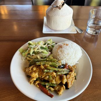 Burma Light - Lunch plate with dry curry chicken, salad, coconut rice and a freshly prepared coconut water. - Noodles Near Me - Folsom, California Burma Light - Lunch plate with dry curry chicken, salad, coconut rice and a freshly prepared coconut water. - Noodles Near Me - Folsom, California