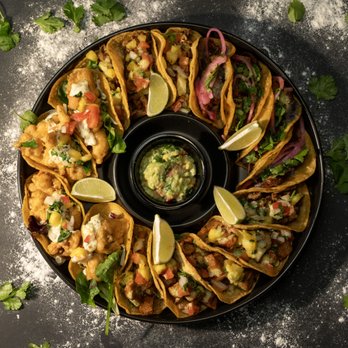 La Veganeria - a plate of fish tacos with guacamole - Vegan Near Me - Dallas, Texas La Veganeria - a plate of fish tacos with guacamole - Vegan Near Me - Dallas, Texas