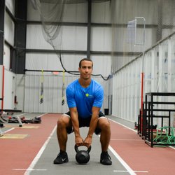 Functional training with kettlebells for lower body strength and mobility.
