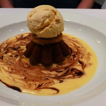 Customs House - Soft centred Valrhona chocolate fondant, salted peanut butter ice cream, vanilla bean Anglaise - French Near Me - Brisbane, QLD