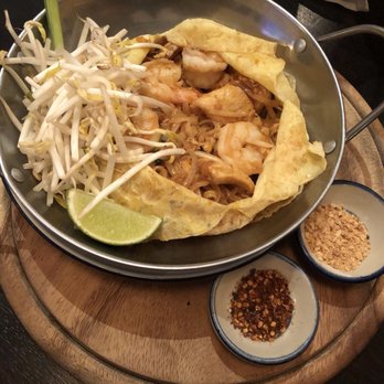 Rim Tanon - Pad thai wrapped in an egg sheet - Thai Near Me - Houston, Texas