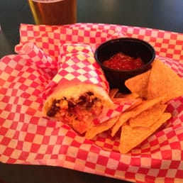 Bean burrito (half eaten) and local IPA. Bean burrito (half eaten) and local IPA.