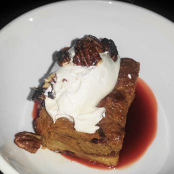 The Smith - Pumpkin Bread Pudding with whipped cream and cranberry sauce - New American Near Me - New York, New York