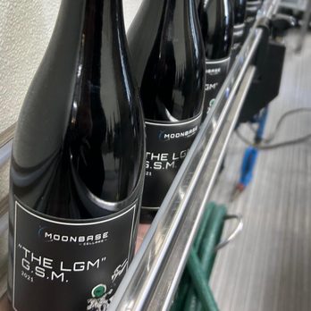 Moonbase Cellars - a row of bottles of wine - Wineries Near Me - Walla Walla, Washington Moonbase Cellars - a row of bottles of wine - Wineries Near Me - Walla Walla, Washington