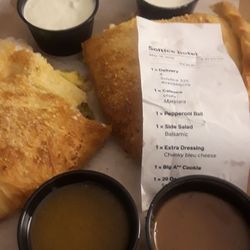 I ordered a Calzone with marinara. I like to dip a my calzone in red sauce. The ticket reads Calzone with a side of marinara. No marinara.