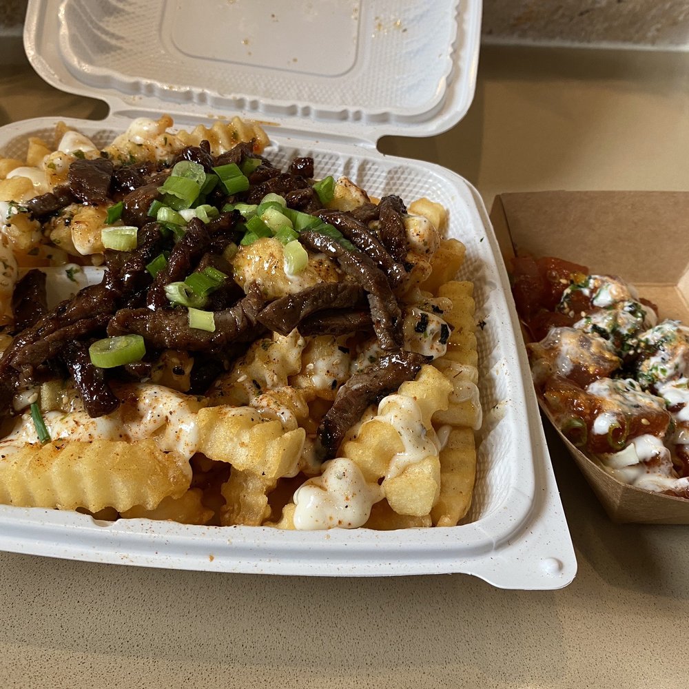 Kalbi fries with a side of spicy ahi Kalbi fries with a side of spicy ahi
