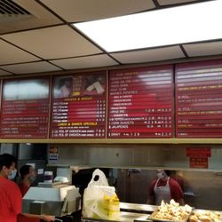 Chicken Express - Order and pay at the counter. The menu is on the board behind.