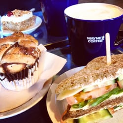 Chai latte, cinnamon bun, fresh veggie breakfast sandwich.