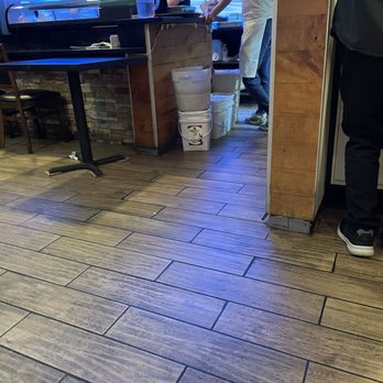 Okinawa Sushi - two men in a kitchen preparing food - Sushi Bars Near Me - Northglenn, Colorado Okinawa Sushi - two men in a kitchen preparing food - Sushi Bars Near Me - Northglenn, Colorado