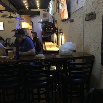 Main Steet Tavern - a man sitting at the bar - Sports Bars Near Me - Huntersville, North Carolina Main Steet Tavern - a man sitting at the bar - Sports Bars Near Me - Huntersville, North Carolina