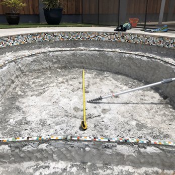 The Pool Doctor - Tile going in and my layout spot for the Baja shelf umbrella - Pool & Hot Tub Service Near Me The Pool Doctor - Tile going in and my layout spot for the Baja shelf umbrella - Pool & Hot Tub Service Near Me