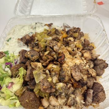Kwik Meal - Chicken and Lamb Combo Over Rice - Street Vendors Near Me - New York, New York Kwik Meal - Chicken and Lamb Combo Over Rice - Street Vendors Near Me - New York, New York