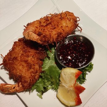 The Crown Room - a plate of fried shrimp with a side of sauce - New American Near Me - Albuquerque, New Mexico