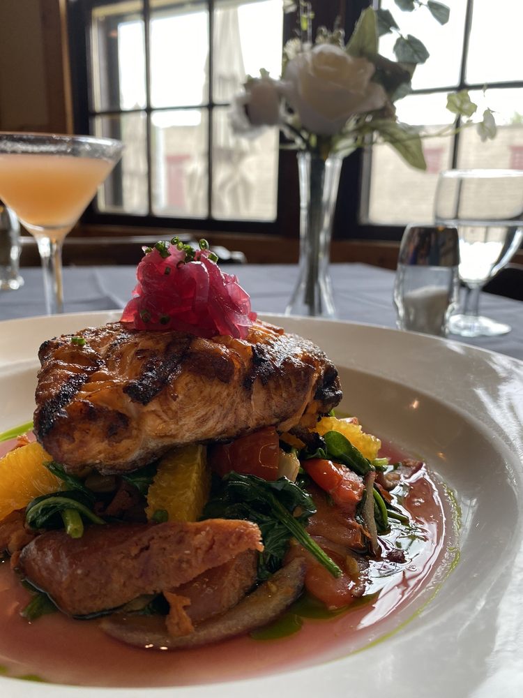 Order Fresh Ora King Salmon food online from Traditions Restaurant at The Bigfork Inn store, Bigfork on bringmethat.com