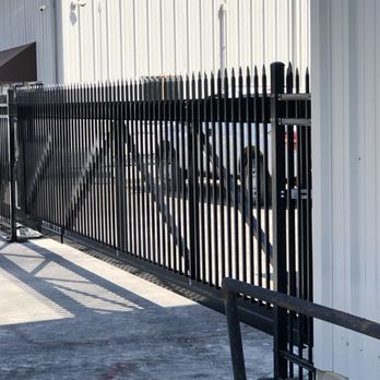 Aaron Fence - Washington County maintenance barn in Ramona. Ameristar's Transport Cantilever Gates with Montage Plus Classic Style fence. - Fences & Gates Near Me - Tulsa, Oklahoma Aaron Fence - Washington County maintenance barn in Ramona. Ameristar's Transport Cantilever Gates with Montage Plus Classic Style fence. - Fences & Gates Near Me - Tulsa, Oklahoma