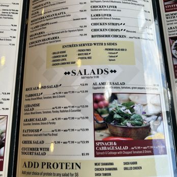 Al-Ameer - Menu - Menu featuring salads, sides, and protein add-ons at Al-Ameer, a Mediterranean restaurant. Includes options like Lebanese, Arabic, and Fattoush salads, with a photo of a spinach and cabbage salad. - Middle Eastern Near Me - Dearborn, Michigan