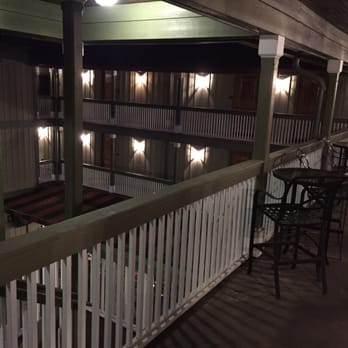 Inlet Sports Lodge - Outdoor patio / courtyard. Perfect place to relax and sip wine (which can be purchased in the lobby) - Hotels Near Me - Murrells Inlet, South Carolina Inlet Sports Lodge - Outdoor patio / courtyard. Perfect place to relax and sip wine (which can be purchased in the lobby) - Hotels Near Me - Murrells Inlet, South Carolina