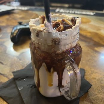 VERSUS - Vanilla churro milkshake (optional with alcohol!) i drank before pic oops - Arcades Near Me - Boston, Massachusetts