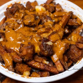 Momo Loco - Butter Chicken Poutine ($12.99) - Dumplings Near Me - Toronto, Ontario