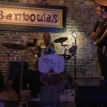 Bamboula's - a band playing in front of a brick wall - Music Venues Near Me - New Orleans, Louisiana