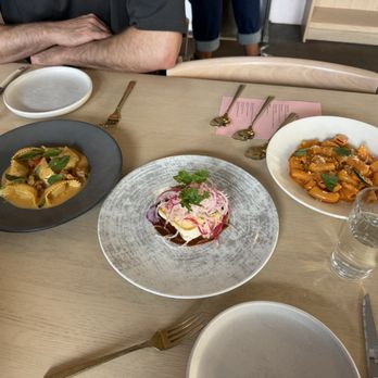 Dario - Left to right - Goat cheese tortelli, Halibut, spicy rigatoni alla vodka - Italian Near Me - Minneapolis, Minnesota