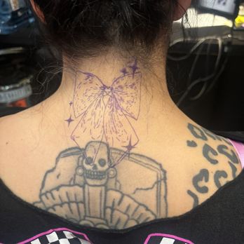 Counts Tattoo Company - Poorly drawn stencil. Please note the lack of clean lines, off-centeredness and ugly overlap with the other tattoos. - Tattoo Near Me - Las Vegas, Nevada