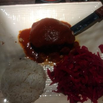 Mayan Kitchen - Rolled pork with red cabbage slaw. - Latin American Near Me - Chattanooga, Tennessee