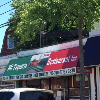 Mi Taqueria Tolte Restaurant - a white van parked in front of a restaurant - Mexican Near Me - Elmhurst, New York Mi Taqueria Tolte Restaurant - a white van parked in front of a restaurant - Mexican Near Me - Elmhurst, New York