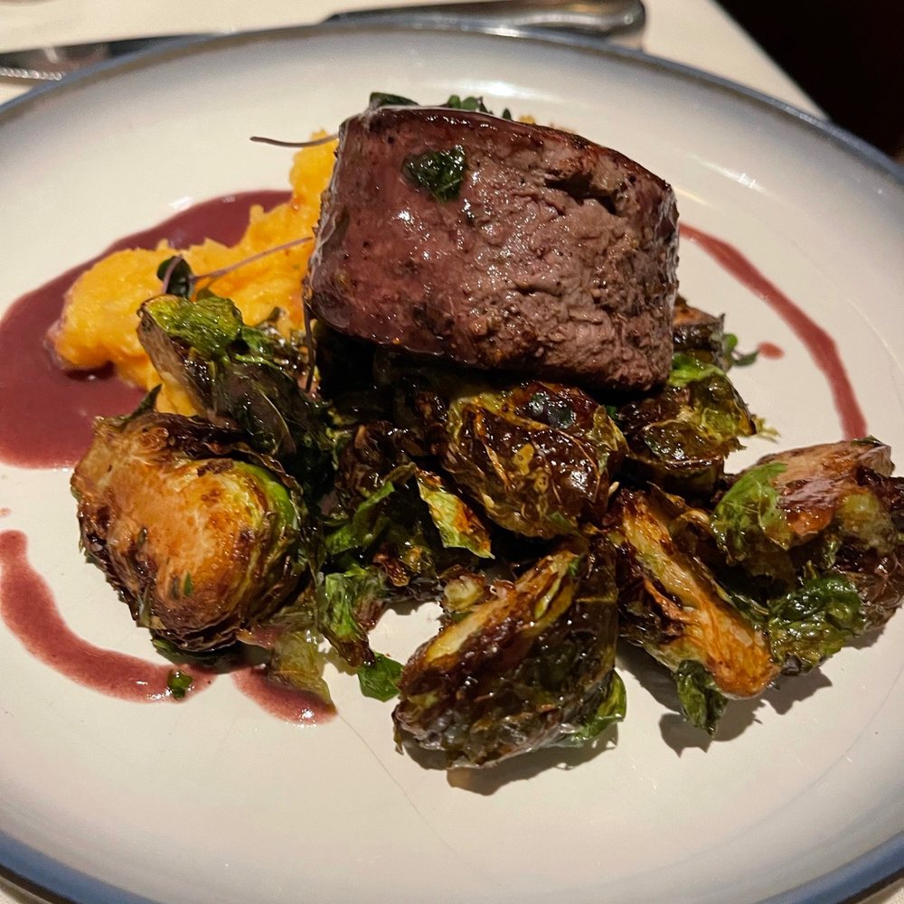 NoJa - Filet with Noja potatoes (a must) and Brussels sprouts - New American Near Me - Mobile, Alabama NoJa - Filet with Noja potatoes (a must) and Brussels sprouts - New American Near Me - Mobile, Alabama