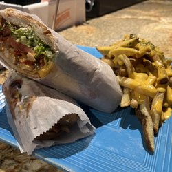 Howl At The Moon - Chicken Philly Cheesesteak with Cheese Fries!