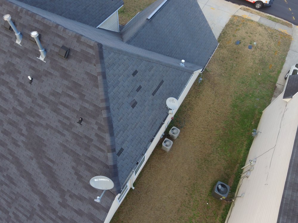 Slide of Empire Roofing & Restoration